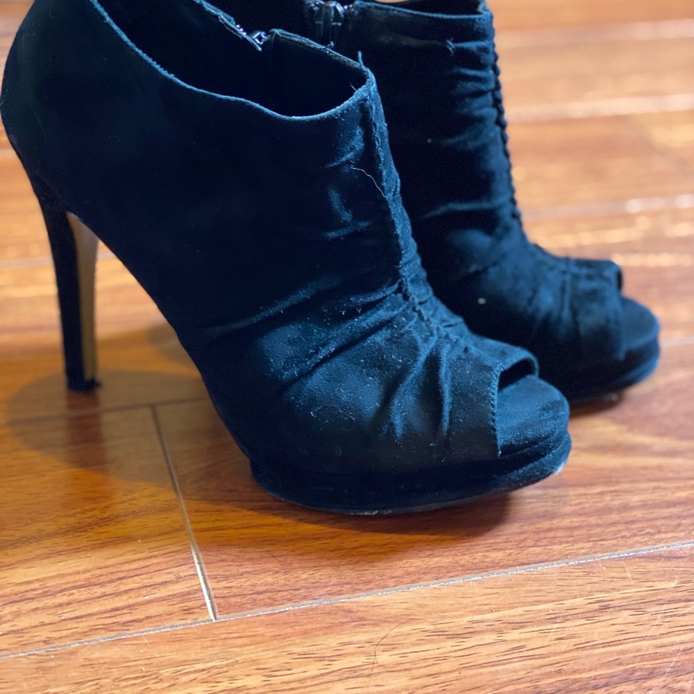 Nine West black suede heels.